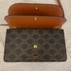 Celine Wallet on strap in Triomphe Canvas and Smooth Lambskin