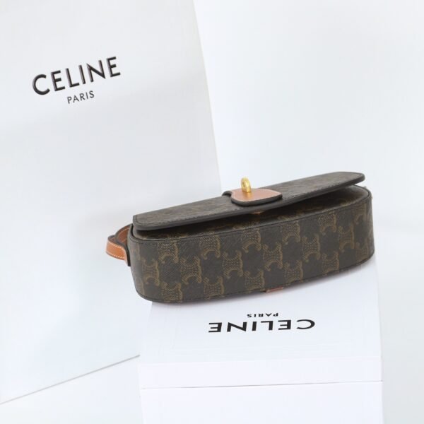 CELINE CLUTCH ON STRAP TABOU IN TRIOMPHE CANVAS AND CALFSKIN - TAN