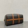 MEDIUM TRAVEL BAG IN TRIOMPHE CANVAS AND CALFSKIN