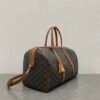 MEDIUM TRAVEL BAG IN TRIOMPHE CANVAS AND CALFSKIN