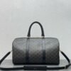 MEDIUM TRAVEL BAG IN TRIOMPHE CANVAS AND CALFSKIN