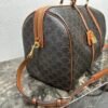 LARGE TRAVEL BAG IN TRIOMPHE CANVAS AND CALFSKIN