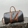 LARGE TRAVEL BAG IN TRIOMPHE CANVAS AND CALFSKIN