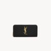 CASSANDRE MATELASSÉ ZIP AROUND WALLET IN GRAIN DE POUDRE LEATHER