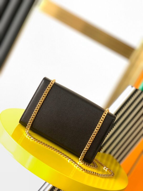 KATE SMALL TASSEL IN GRAIN DE POUDRE EMBOSSED LEATHER