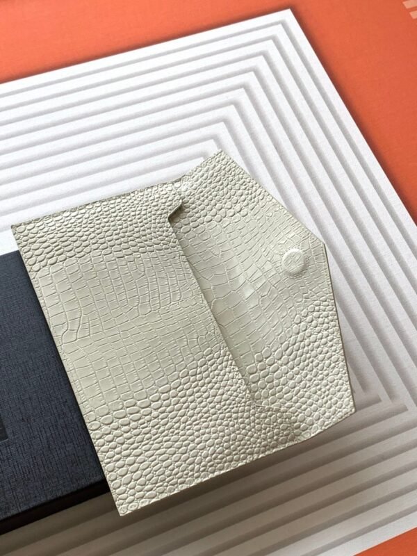 UPTOWN POUCH IN CROCODILE-EMBOSSED SHINY LEATHER