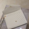 CASSANDRE MATELASSÉ FLAP POUCH IN GRAIN DE POUDRE LEATHER