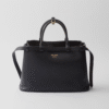 Prada Buckle medium leather handbag with double belt