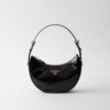 Prada Arqué naplak patent leather shoulder bag