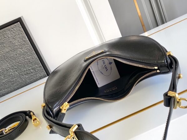 Prada Arqué naplak patent leather shoulder bag