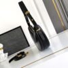 Prada Arqué naplak patent leather shoulder bag