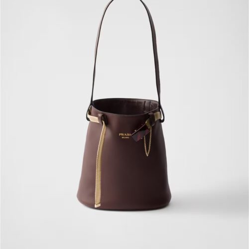 Prada Buckle leather bucket bag with jeweled belt