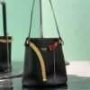 Prada Buckle leather bucket bag with jeweled belt