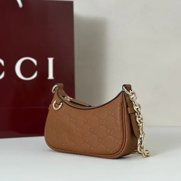 847091 AAFDV 6207-2 (2) Gucci GG Emblem Debossed Leather Mini Shoulder Bag